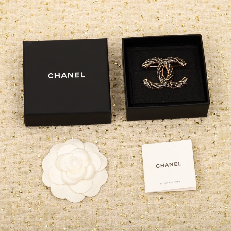 Ch**el brooches